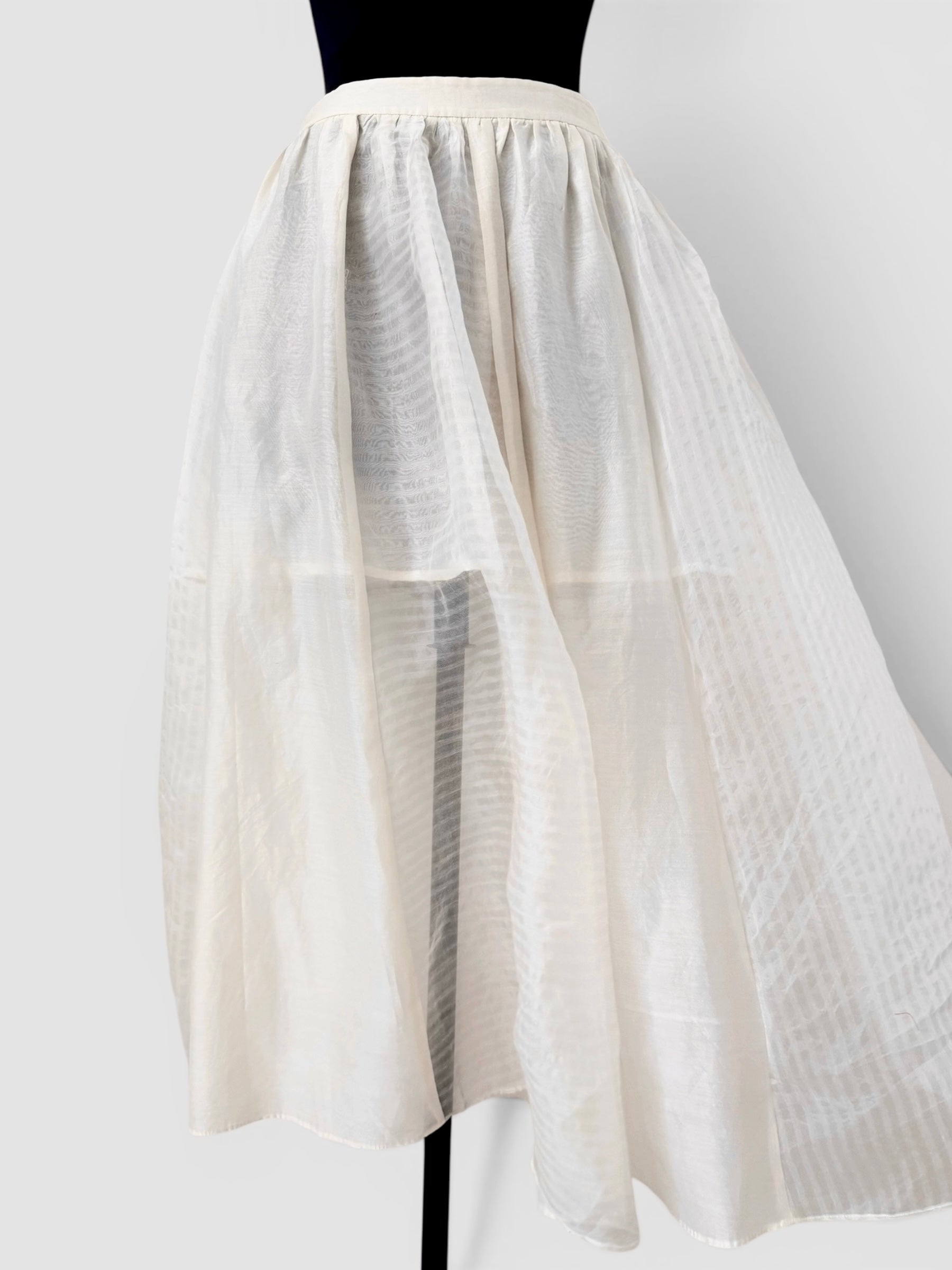 Ivory panelled skirt and peplum belt
