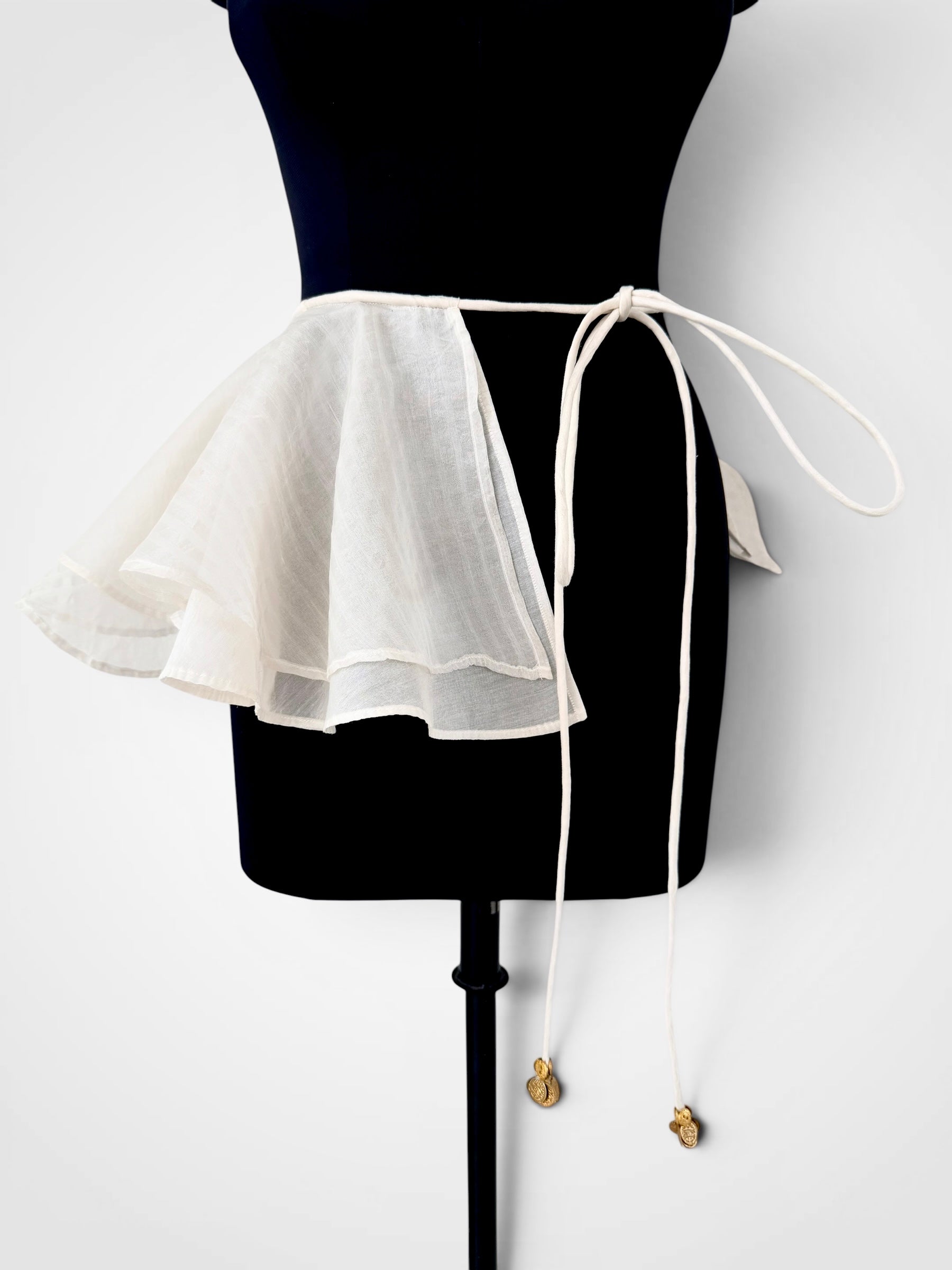 Ivory panelled skirt and peplum belt