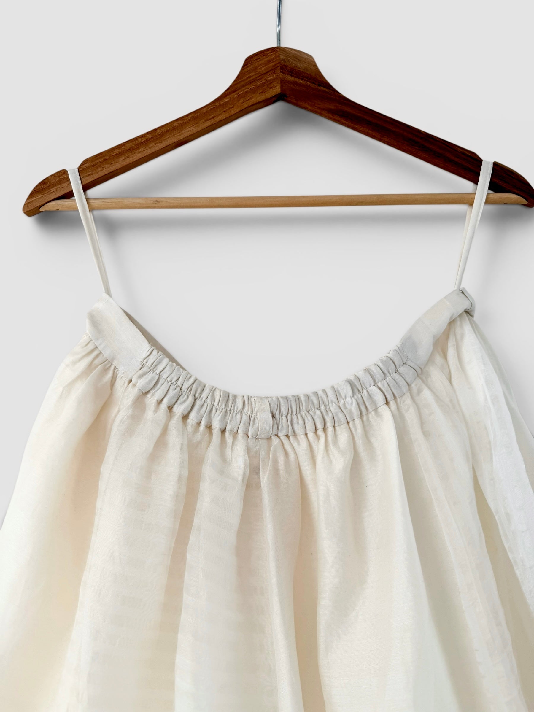 Ivory panelled skirt and peplum belt