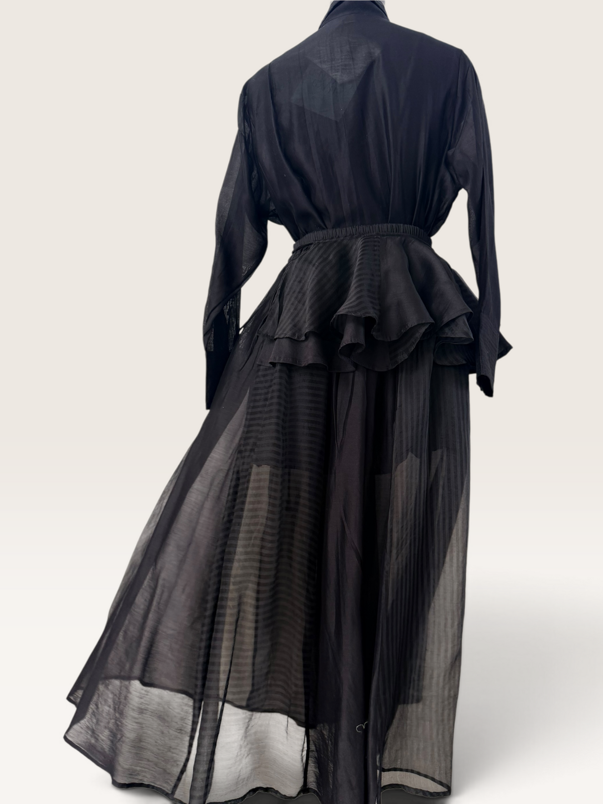 Black sheer panelled skirt and peplum belt