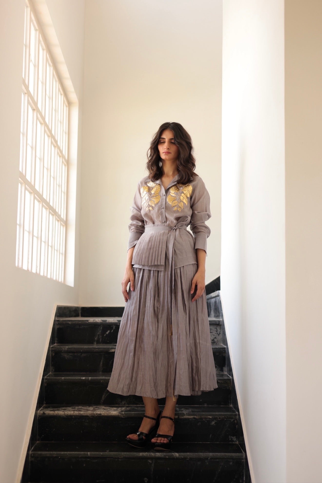 Steel grey panelled crushed skirt and pleated peplum belt